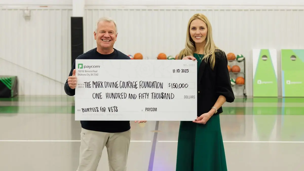 Paycom presenting a $150,000 Burpees For Vets check to the Mark Divine Courage Foundation